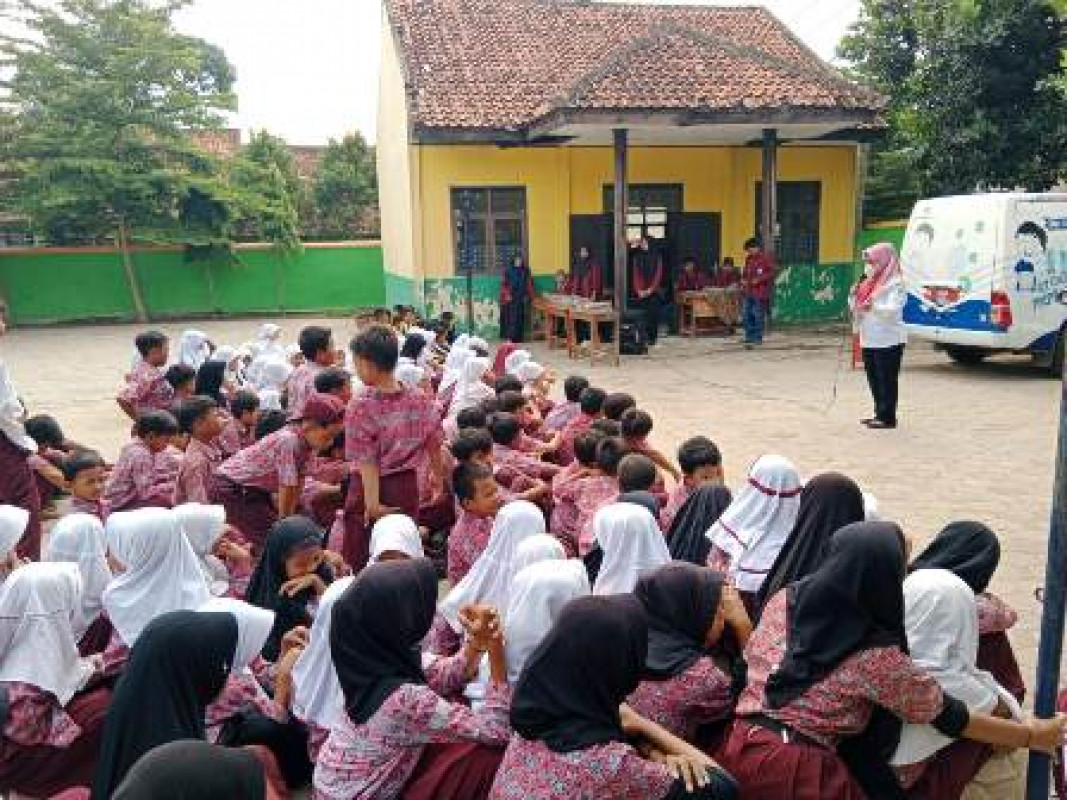 PERPUSTAKAAN DAN MASYARAKAT