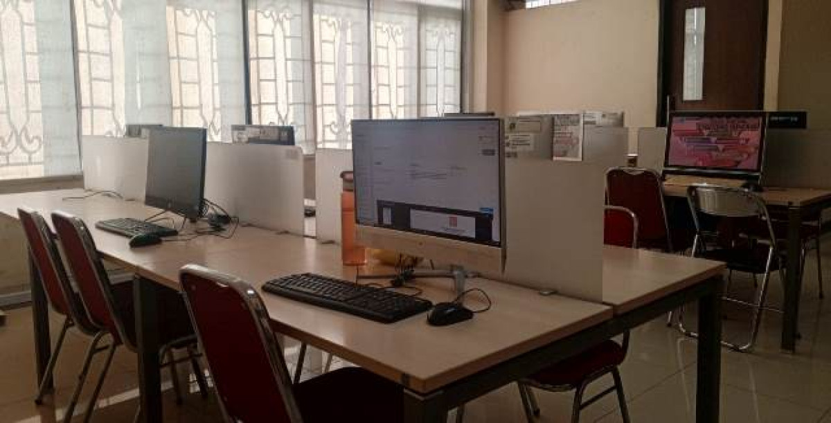 Perpustakaan di Tengah Gelombang Teknologi : Bertahan atau Berubah?